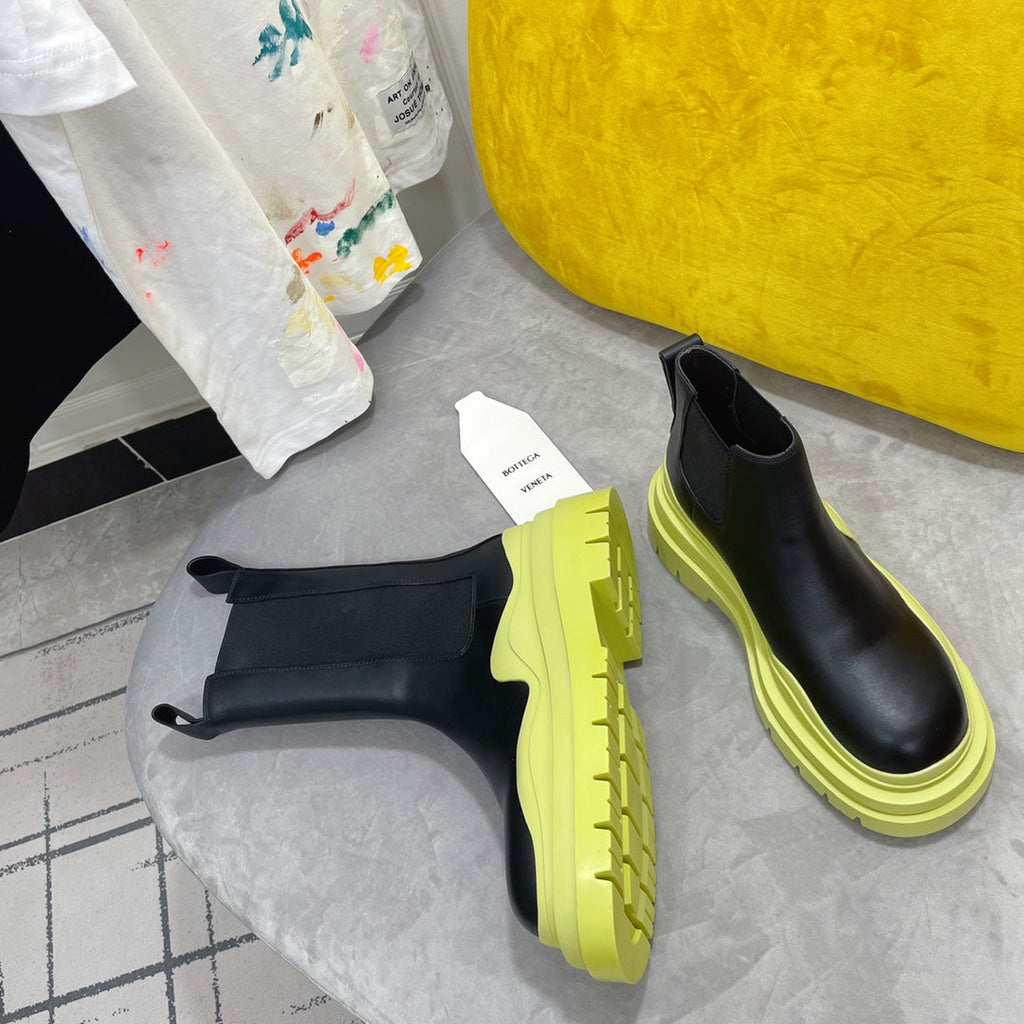 BOTTEGA VENETA TIRE CHELSEA BOOT IN BLACK MIX NEON YELLOW CALFSKIN