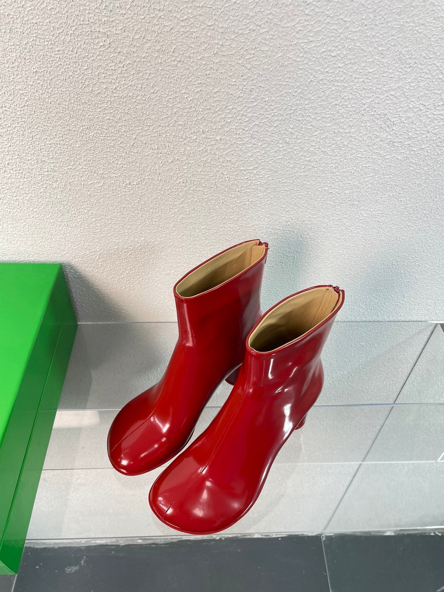 BOTTEGA VENETA ATOMIC ANKLE BOOT IN RUBY RED CALFSKIN 75 MM