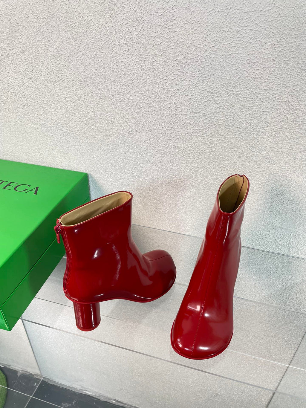 BOTTEGA VENETA ATOMIC ANKLE BOOT IN RUBY RED CALFSKIN 75 MM