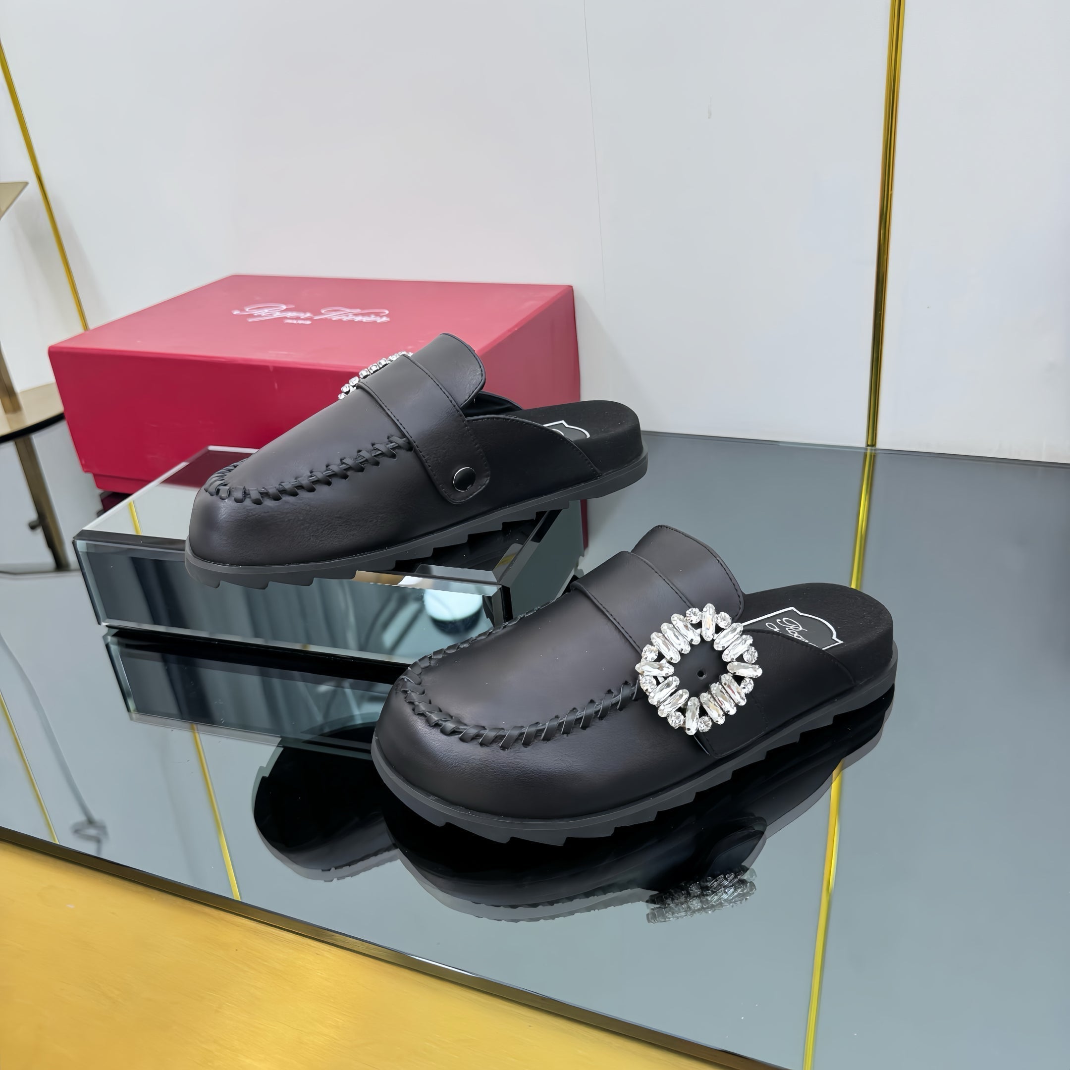 SLIDY VIV' MULES IN BLACK CALFSKIN