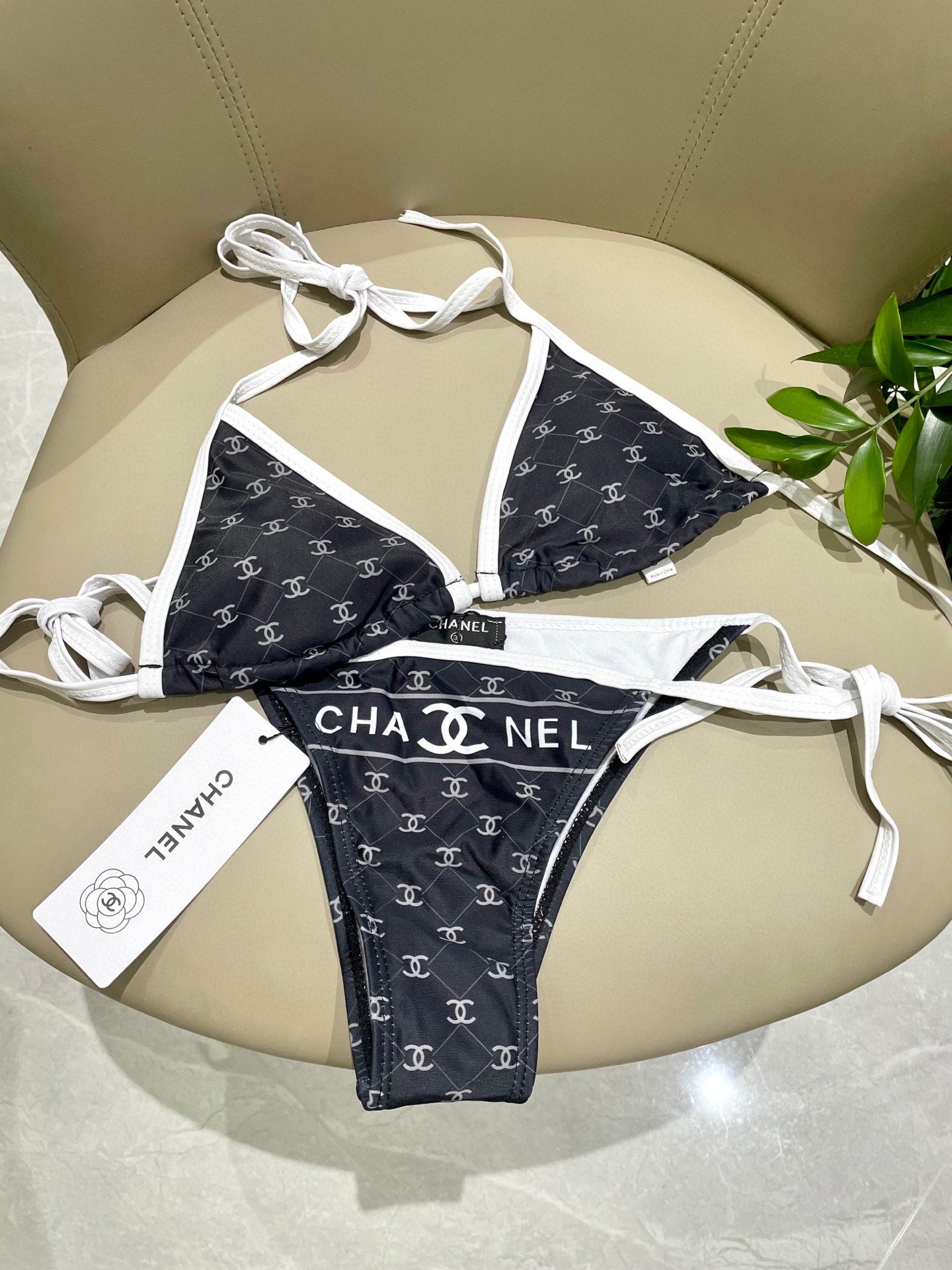 CHANEL BIKINI SWIMSUIT SET IN BLACK AND WHITE TRIM WHITE LOGO PRINTED 608921