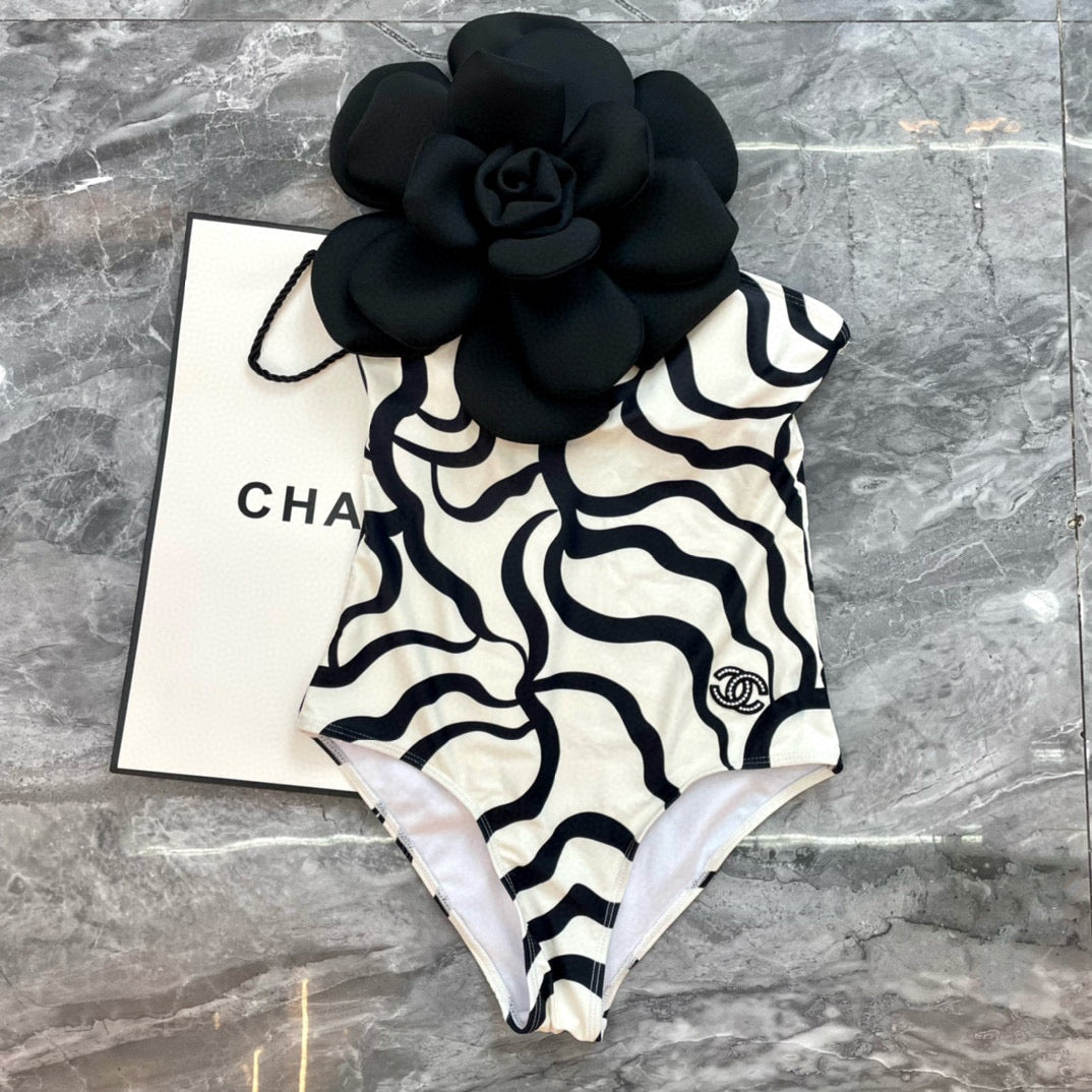 CHANEL ONE-PIECE SWIMSUIT WITH FLORAL PATTERN IN BLACK AND WHITE 627827