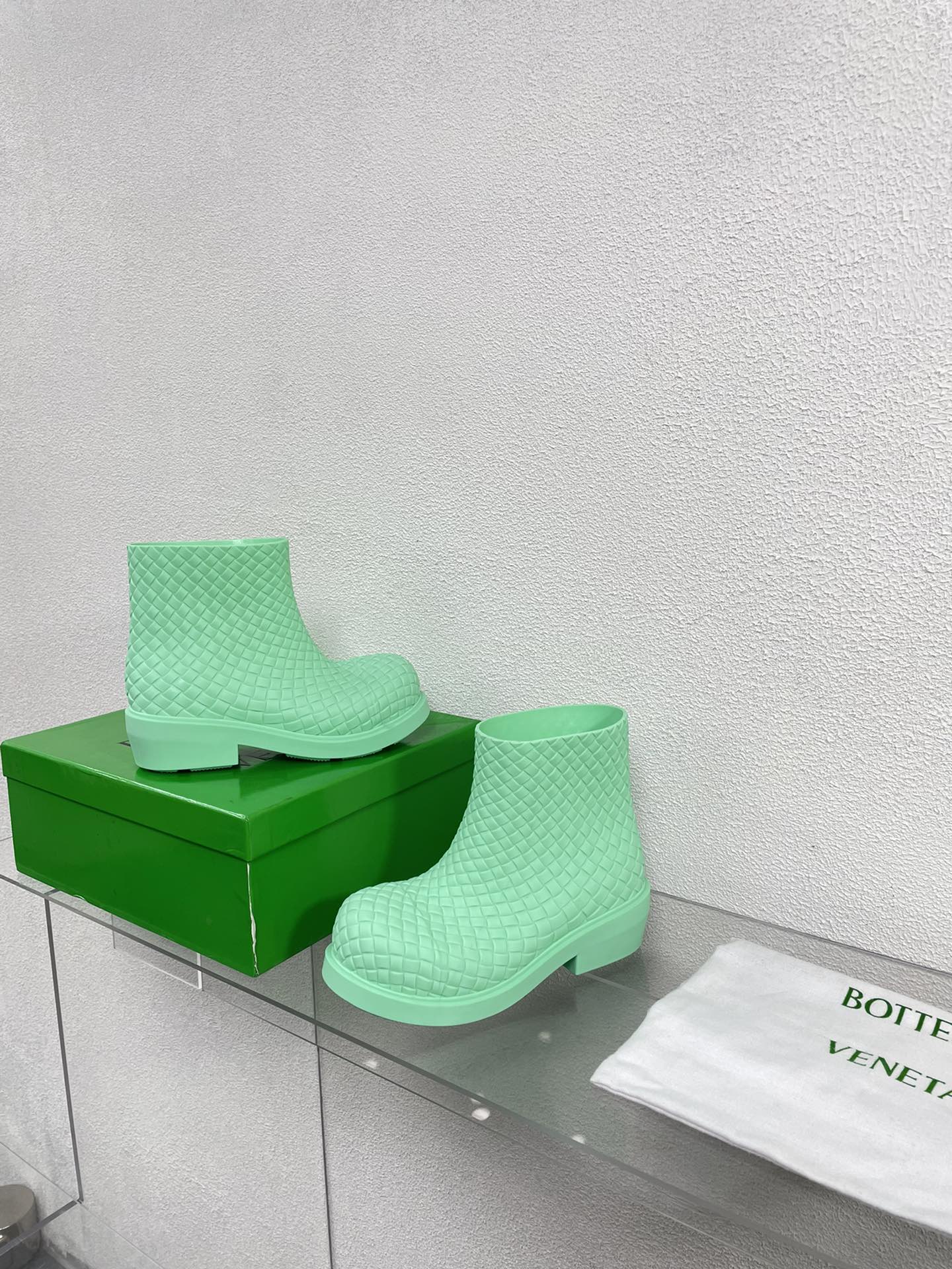 BOTTEGA VENETA FIREMAN BOOTS IN GREEN MINT RUBBER WITH ICONIC INTRECCIO MOTIF