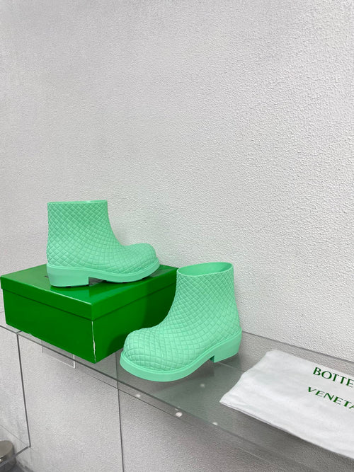 BOTTEGA VENETA FIREMAN BOOTS IN GREEN MINT RUBBER WITH ICONIC INTRECCIO MOTIF