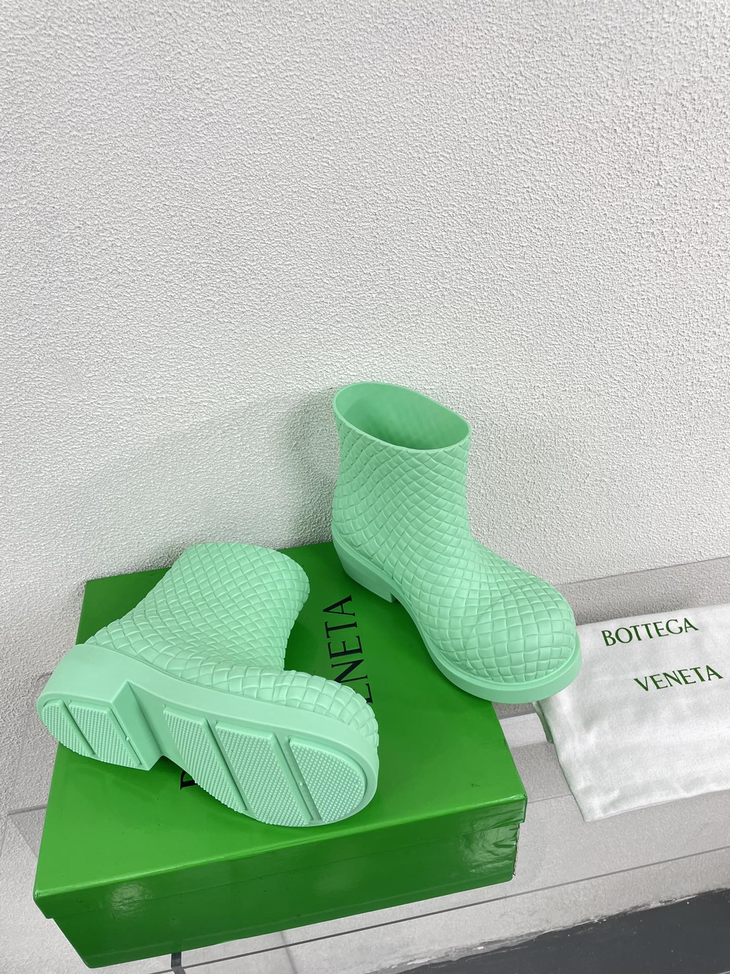 BOTTEGA VENETA FIREMAN BOOTS IN GREEN MINT RUBBER WITH ICONIC INTRECCIO MOTIF