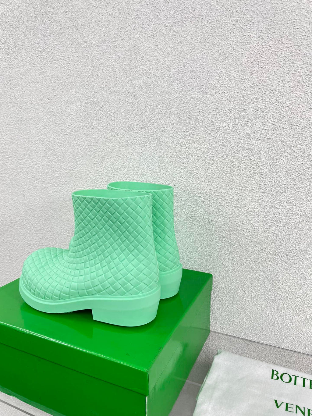 BOTTEGA VENETA FIREMAN BOOTS IN GREEN MINT RUBBER WITH ICONIC INTRECCIO MOTIF